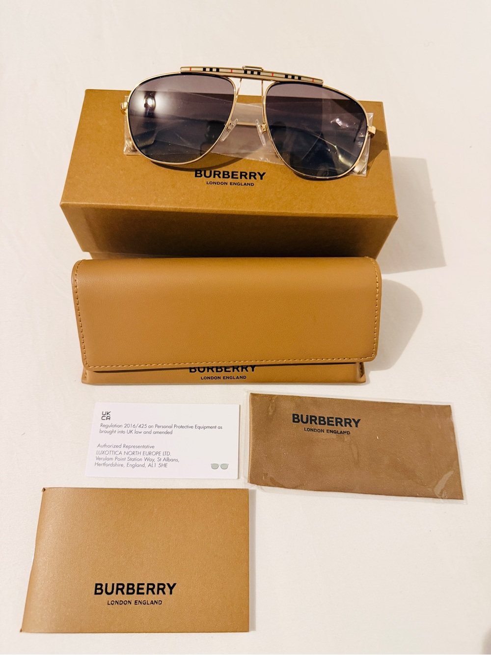 Burberry Gold Frame Sunglasses with Black Gradient Lenses and Tan Case